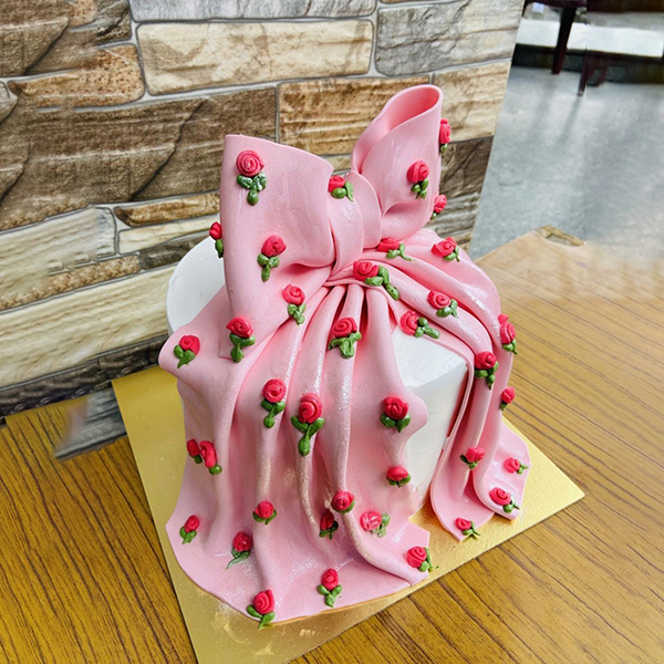 Pink Ribbon & Rosette Celebration Cake